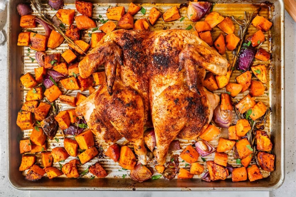 Spatchcock Chicken with Sweet Potatoes on a sheet pan