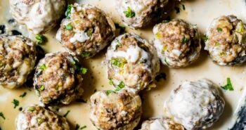Skillet of creamy Swedish meatballs.