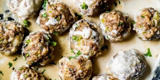 Skillet of creamy Swedish meatballs.