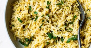 Bowl of rice pilaf with fork.