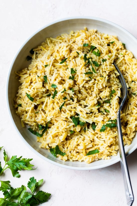 Bowl of rice pilaf with fork.